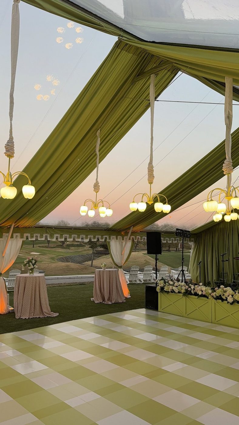Green and white gingham dance floor wrap under a clear-top tent